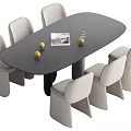 Modern Dining Table Set with Oval Black Tabletop Gray Dining Chairs and Magazine with Fruits