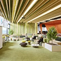 Casual Lounge Area With Green Carpet Wooden Ceiling Orange Walls And Relaxing Seating Spaces