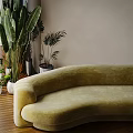 Modern Curved Three-Seater Sofa in Light Yellow with Green Plants and Wooden Floor