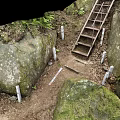 Metal Staircase In Natural Setting With Rock Walls Green Plants And Dirt Ground