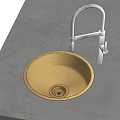 Round Golden Kitchen Sink with Silver Faucet on Gray Countertop