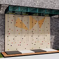 Outdoor Recreational Climbing Wall With Brick Wall Background Colorful Holds And Safety Mats