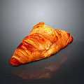 Golden Flaky Freshly Baked Croissant With Crispy Layers On Dark Reflective Surface