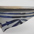 Traditional Blue and White Decorative Ceramic Vessel Fragment with Intricate Patterns