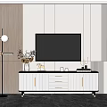 Modern White TV Stand With Gold Handles And Decorative Items On Top