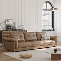 Brown Leather Sectional Sofa In Living Room With White Walls And Window