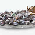 Heap of Garbage With Plastic Bags And Cardboard Boxes On Concrete Ground