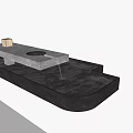 Water Fountain With Marble Countertop Square Object Circular Hole And Water Flowing Into Black Basin