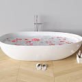 White Oval Bathtub with Water and Red Rose Petals on Wooden Floor with Bathroom Slippers