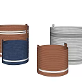 Various Colored Woven Storage Baskets With Striped Accents For Home Organization