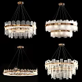 Elegant Modern Chandeliers Featuring Glass Discs Cylinders And Golden Layered Frames