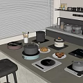 Modern Kitchen Countertop With Various Electric Appliances And Cookies Cups On Shelves