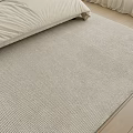 Comfortable Light Colored Lazy Sofa In Bedroom With Wooden Floor And Soft Rug