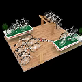Multiple White Bicycles Showcased on Wooden Floor with Green Display Platforms and Plant Decor
