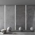 Gray Stone Walls with Vertical White Lines and Wooden Stool and White Spheres on Floor