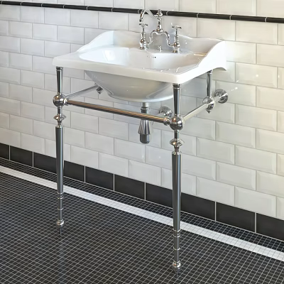 Elegant White Washbasin with Chrome Stand Against White Brick Wall and Black Mosaic Floor 3d model