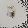 White Round Bedside Table With Drawers Glass Vase And Yellow Flowers On Light Colored Carpet