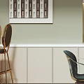 Modern Restaurant Dining Area With White Table Black Chairs Flower Arrangement And Wall Art