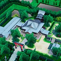 Traditional Ancient Architecture Complex Featuring Classic Roof And Lush Garden Surrounded By Trees