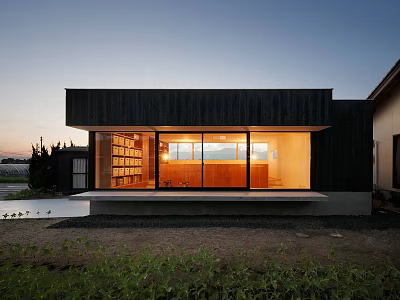 Modern Detached House Featuring Black Exterior Large Glass Windows Sunset Glow and Illuminated Interior 3d model