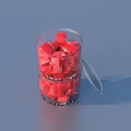 Transparent Glass Cup With Handle Filled With Red Cube Shaped Objects For Daily Use