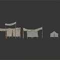 Multiple Simple Fabric Tents with Wooden Support Frames and Canvas Covers