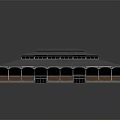 Brick Walled Building With Metal Roof Arched Windows Central Raised Roof Section And Symmetrical Design