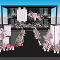 Elegant Banquet Hall With Pink Floral Aisle Decoration Drapes And Chandeliers For Wedding Event