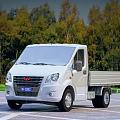 Wuling Utility Truck With Open Cargo Bed In Parking Lot