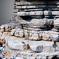 Garden Landscape Featuring Stacked Rockery With Natural Textures And Layered Structure