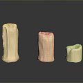 Natural Cream Colored Candles With Wooden Texture And Different Sizes On Black Surface