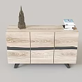 Light Wood TV Stand With Cabinet Doors And Decorative Model Stack Of Books
