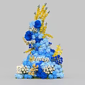 Floral Display Design With Blue Yellow And White Flowers In Tower Shape