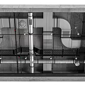 Gray Ceiling Architectural Structure With Metal Pipes And Framework Details