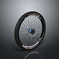 Mountain Bike Wheel with Treaded Tire Spokes and Blue Hub Design