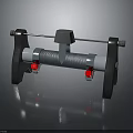 Industrial Mechanical Device With Metal Frame Black Support Stands Cylindrical Body Red Knobs