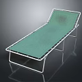 Sturdy Medical Examination Bed With Green Padded Surface And Metal Frame For Hospital Use