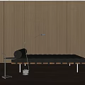 Contemporary Ottoman With Padded Cushion Against Wooden Wall Paneling And Floor Lamp Near Side Table