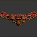 Ornate Red And Gold Decorative Piece With Lion Head And Intricate Scroll Patterns
