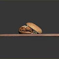 Delicious Juicy Hamburger With Sesame Seed Bun On Wooden Cutting Board