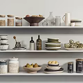 Organized Kitchenware On White Shelves With Jars Bowls Plates Vases And Fruits