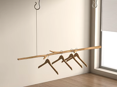 Wooden Clothes Hangers On Hanging Rod Against Light Wall With Wooden Floor And Window 3d model