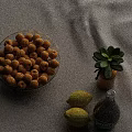 Inflatable Fruit Themed Decor With Apricots Lemons Olive Oil And Succulent Plant