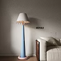 Blue Floor Lamp with White Lampshade Pink Edge and Green Dinosaur Toy on Beige Sofa