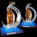 Martell Bottles and Whiskey Glasses with Amber Liquid in Silver Curved Stands on Blue Bases