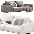 Velvet Two Seater Sofa In Gray And White With Soft Pillows Decorative Balls And Throw Blanket