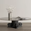Round Glass Top Coffee Table With Black Carved Base And Decorative Vase