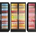 Three Glass Door Display Refrigerators Stocked With Colorful Bottled Beverages