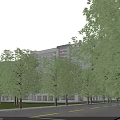 Modern Hospital Building With Contemporary Design Surrounded by Green Trees and Access Roads