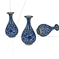 Three Blue and White Ceramic Vases With Traditional Ornate Floral Patterns